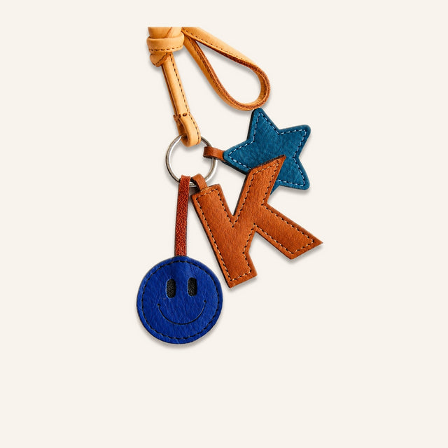 SMILEY, LETTER AND STAR KEYCHAIN