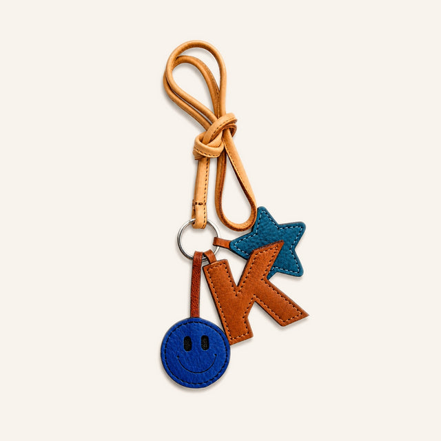 SMILEY, LETTER AND STAR KEYCHAIN